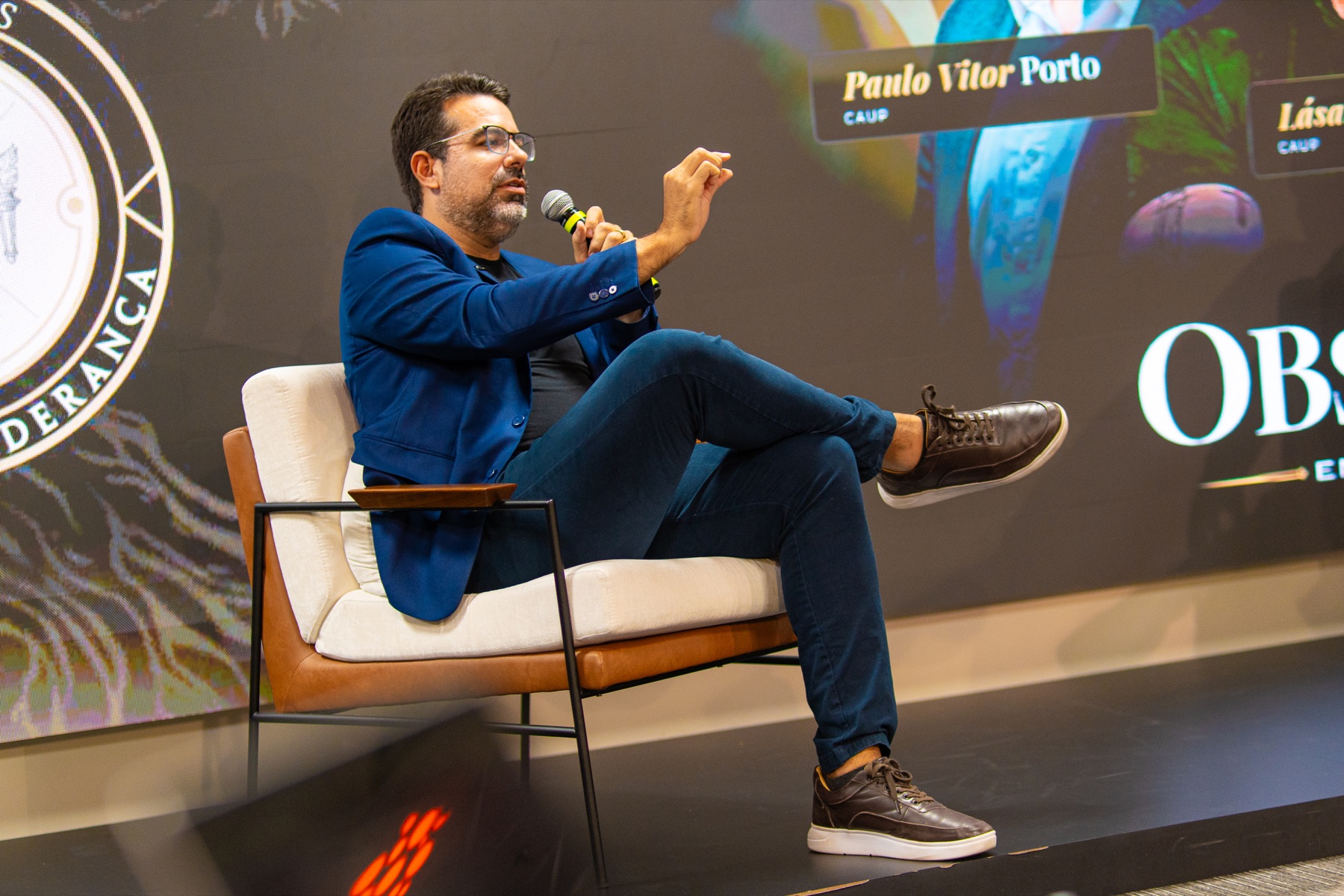 Paulo Vitor Porto no palco do Obsessão em Negócios